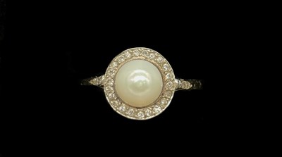 Lot 1266 - An 18ct white gold diamond and pearl ring,...
