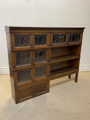 Lot 1154 - SIMPOLES, CHAPTER; an oak bookcase, with an...