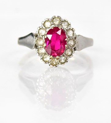 Lot 1048 - A 9ct yellow gold ring set with an oval pink...