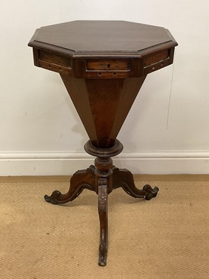 Lot 612 - A 19th century mahogany octagonal sewing work...