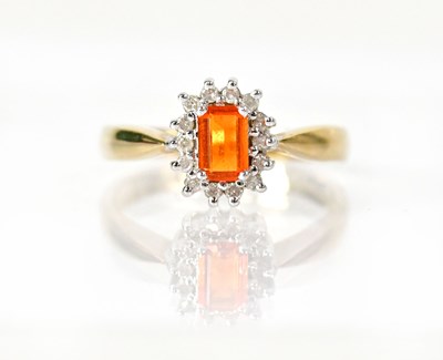 Lot 1047 - A 9ct yellow gold ring set with a rectangular...