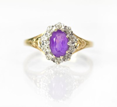 Lot 1044 - A 9ct yellow gold ring set with an oval...