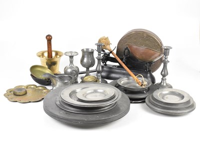 Lot 1480 - A collection of pewter including plates, cups,...