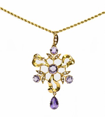 Lot 1374 - A 15ct yellow gold Art Nouveau amethyst and...