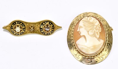 Lot 1432 - A 15ct yellow gold black enamel and seed pearl...