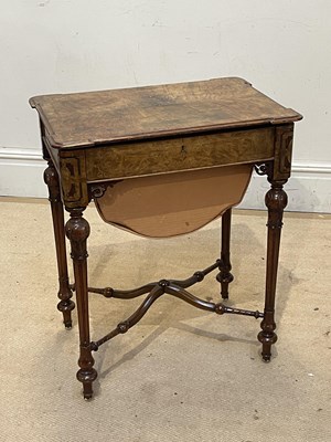 Lot 1128 - A Victorian inlaid walnut sewing table, the...