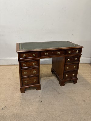 Lot 1204 - An early 20th century mahogany kneehole twin...