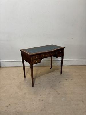 Lot 1125 - An Edwardian inlaid mahogany serpentine front...