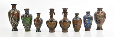 Lot 574 - Eight Japanese cloisonné vases including a...