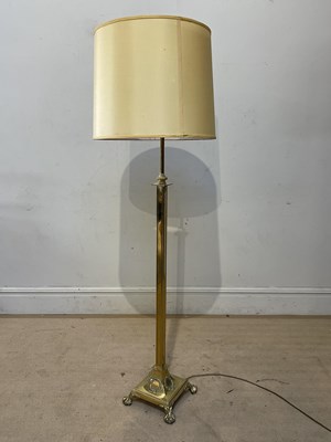 Lot 1564 - A late 19th century brass adjustable standard...