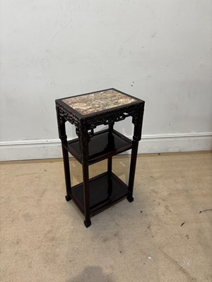 Lot 1127 - A Chinese carved rosewood three tier marble...