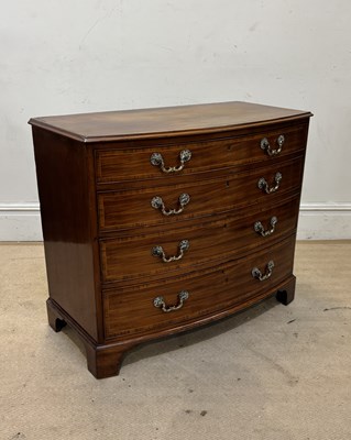Lot 1129 - A 19th century inlaid mahogany bowfront chest...