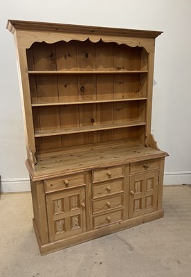 Lot 1038 - A modern pine dresser, with boarded back above...