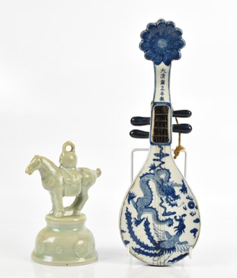 Lot 555 - A Chinese blue and white porcelain model of a...