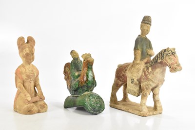 Lot 572 - A Chinese Tang style model of a horse and...