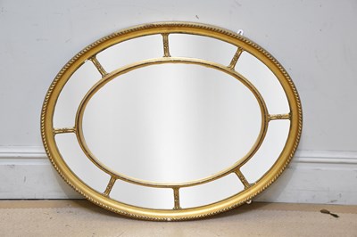 Lot 1016 - A 19th century gilt wall mirror, 73 x 92cm.