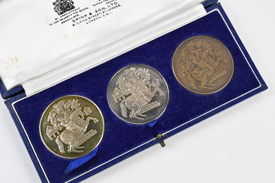 Lot 1066 - SPINK & SON; three cased medallions...