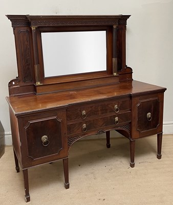 Lot 1214 - A 19th century mahogany inverted breakfront...