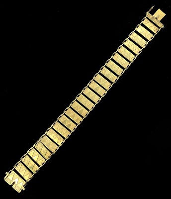 Lot 1123 - A 9ct yellow gold broad rectangular link...