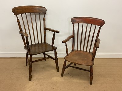 Lot 645 - Two elm and beech farmhouse chairs, height 107cm.