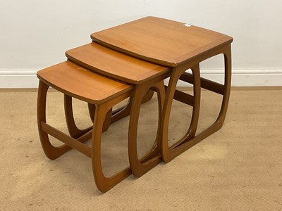 Lot 627 - NATHAN; a nest of teak tables, height 50cm.