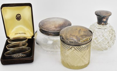 Lot 828 - Three hallmarked silver napkin rings...