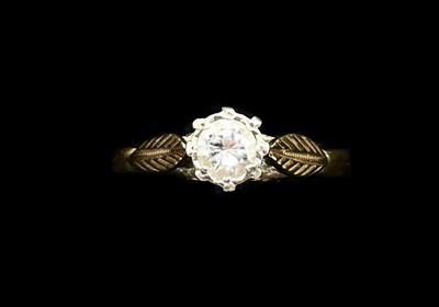 Lot 1134 - An 18ct yellow gold platinum tipped diamond...
