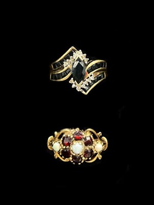 Lot 1137 - Two 9ct yellow gold dress rings, one set with...