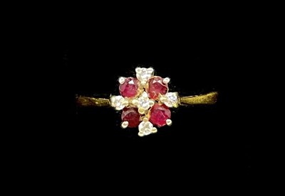 Lot 1194 - An 18ct yellow gold flower head ring (cut),...