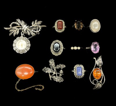 Lot 1200 - A small group of silver dress rings, a 9ct...