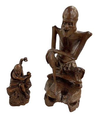 Lot 631 - Two early 20th century carved boxwood figures,...