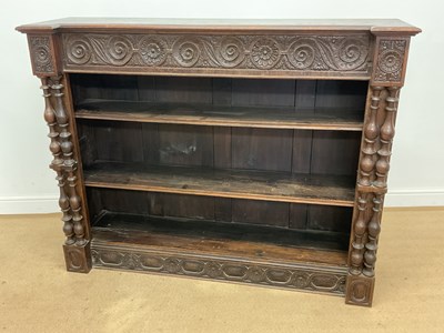 Lot 618 - A carved oak bookcase, height 114cm, width...