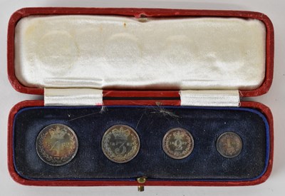 Lot 1487 - A cased 1887 Maundy four coin set including...