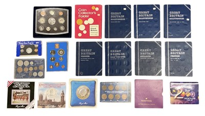 Lot 1444 - A collection of coin sets and year booklets...