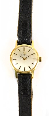 Lot 1694 - OMEGA; a lady's 9ct gold wristwatch with baton...