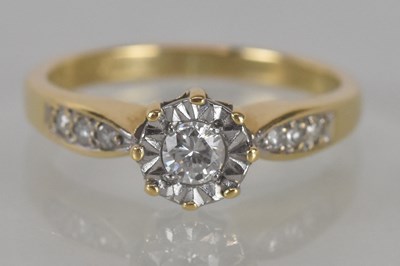 Lot 1128 - An 18ct yellow gold illusion set diamond...