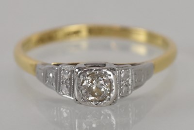 Lot 1143 - An 18ct yellow gold diamond set solitaire ring,...