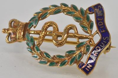 Lot 1277 - A 9ct yellow gold Royal Army Medical Corps...