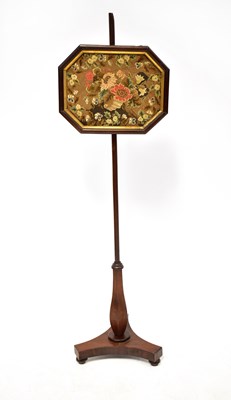 Lot 82 - A 19th century mahogany pole screen, with...