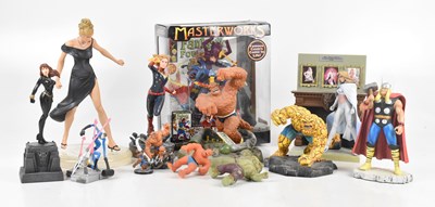 Lot 834 - A collection of loose Marvel statues, to...