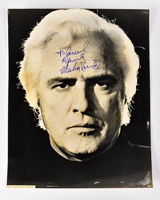 Lot 618 - MARLON BRANDO; a black, white and sepia...