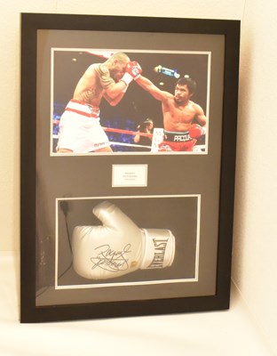 Lot 1410 - MANNY PACQUIAO (PACMAN); a framed display...