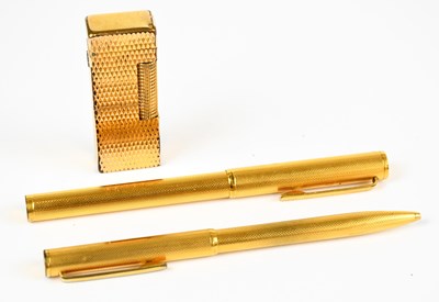 Lot 118 - DUNHILL; a gold-plated fountain pen with 14ct...