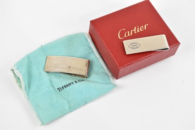 Lot 690 - CARTIER; a sterling silver money clip, boxed,...