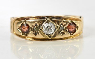 Lot 160 - A yellow metal diamond and ruby three stone...