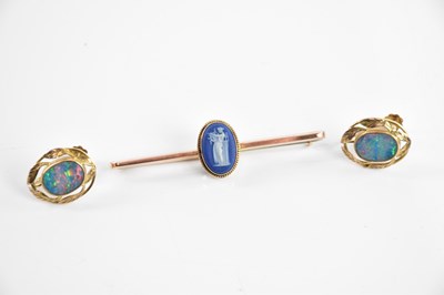 Lot 304 - A pair of 9ct yellow gold and seal backed opal...