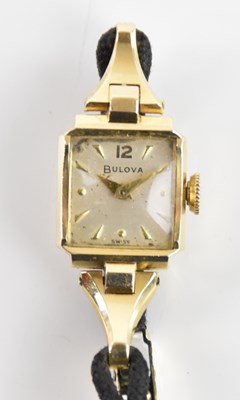 Lot 585 - BULOVA; a lady's vintage 14ct yellow gold...