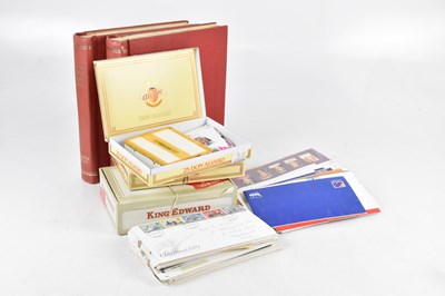 Lot 348 - WORLD STAMPS; two albums plus loose in cigar...