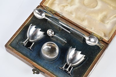 Lot 1221 - A six piece Russian silver egg cup set, in...