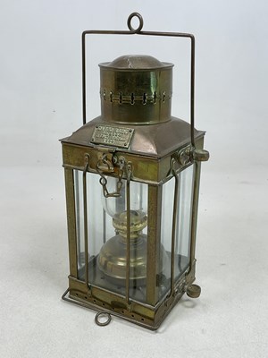Lot 549 - A reproduction brass oil lamp, bearing plaque '...